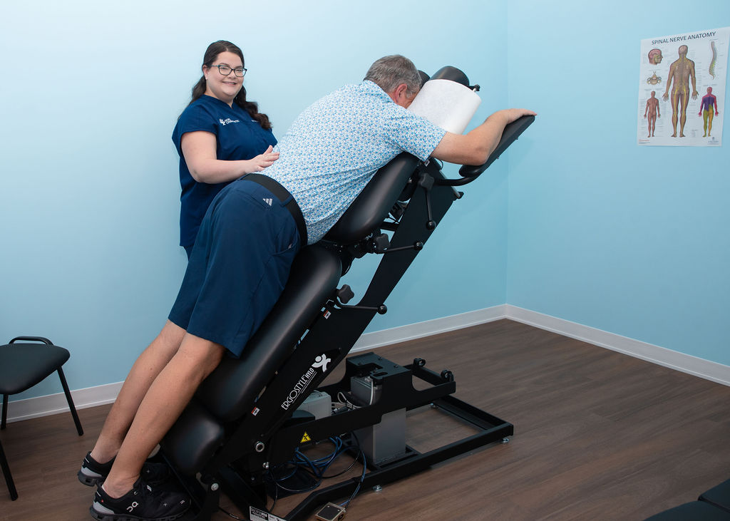Dr. Melanie with Patient on Incline Table
